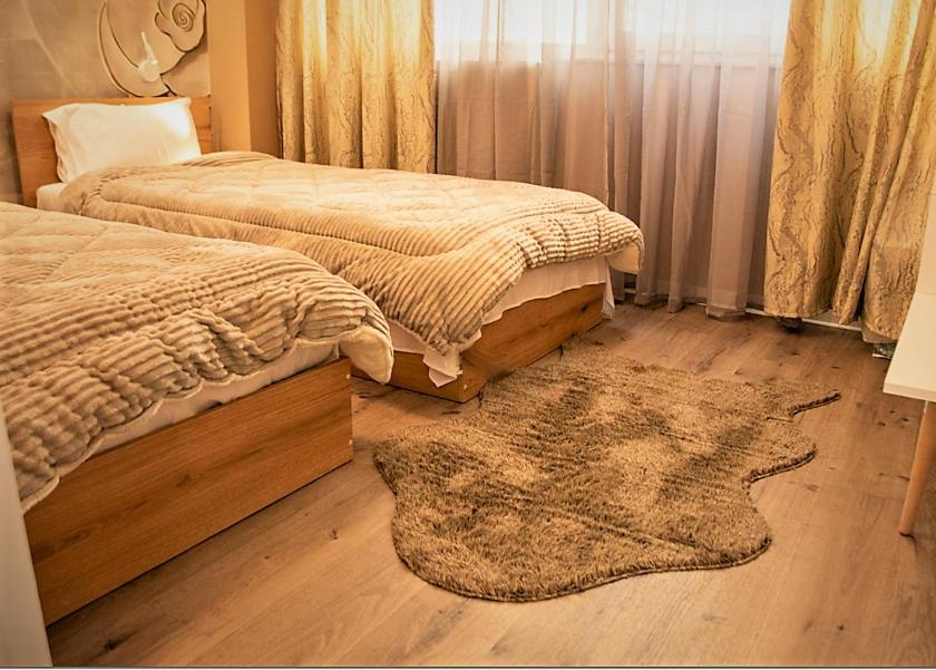 Łóżko lub łóżka w pokoju w obiekcie JuKeBoX Suite 2 BEDROOMS - BIG BALCONY
