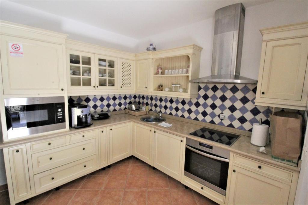 Kuchyň nebo kuchyňský kout v ubytování Villa Istriana