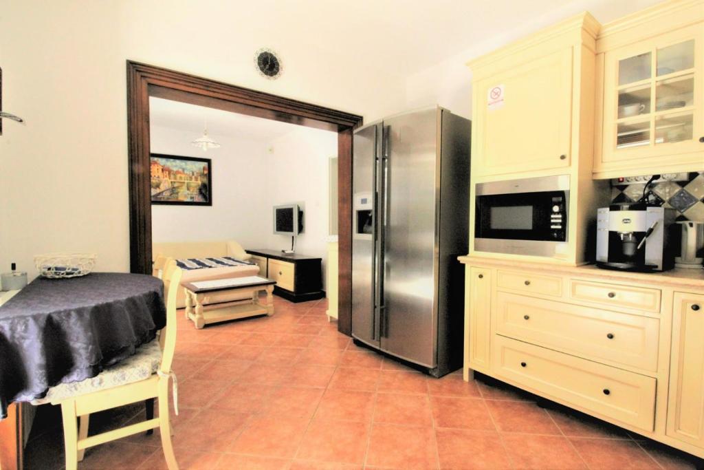 Kuchyň nebo kuchyňský kout v ubytování Villa Istriana