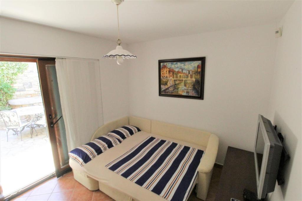 Postel nebo postele na pokoji v ubytování Villa Istriana