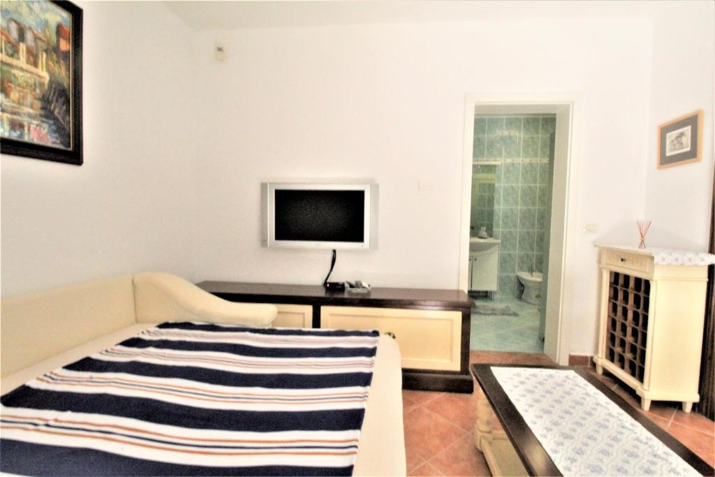 Postel nebo postele na pokoji v ubytování Villa Istriana