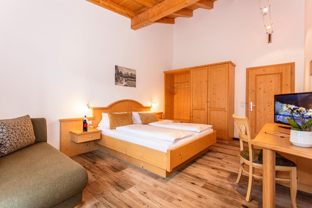 Postel nebo postele na pokoji v ubytování Berggasthof Hinterreit