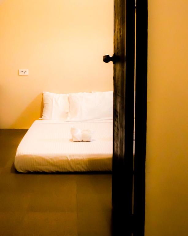Postel nebo postele na pokoji v ubytování Ana-as Apartelle (GGL)