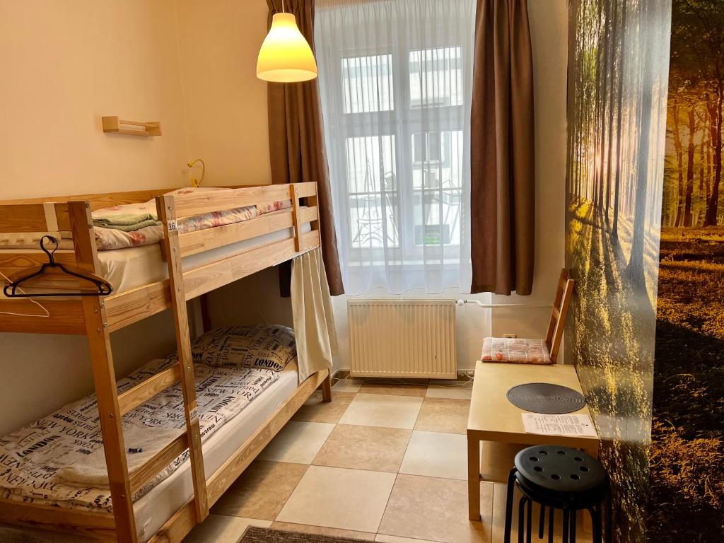 Postel nebo postele na pokoji v ubytování GRAN hostel