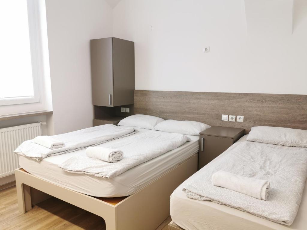 Postel nebo postele na pokoji v ubytování Rooms Ambrožič