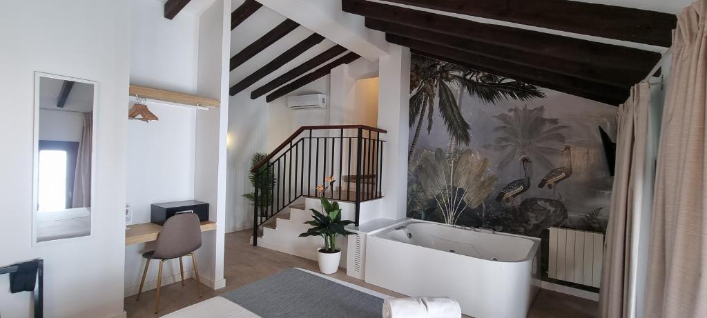 A bed or beds in a room at Vitium Córdoba
