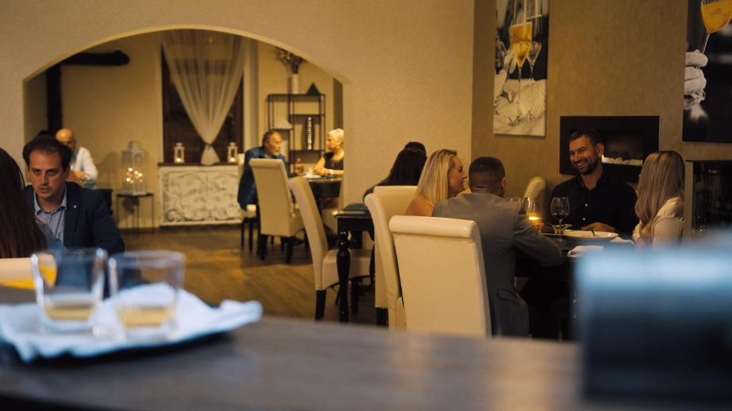 Hostia v ubytovaní Hotel MERTIN
