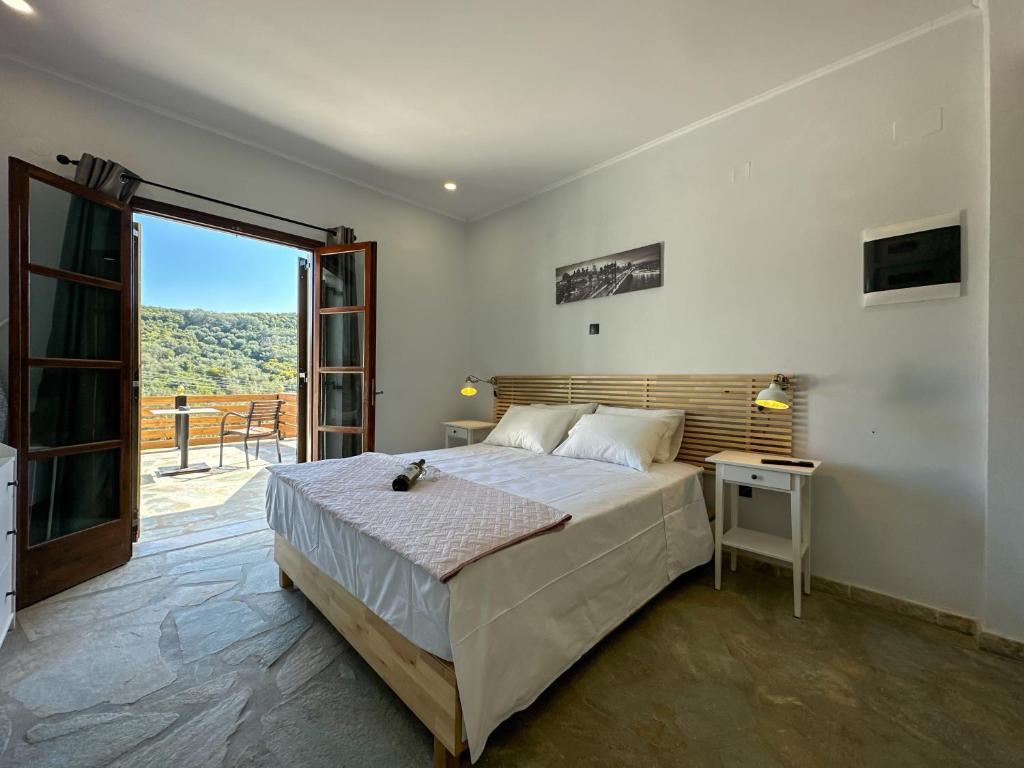 A bed or beds in a room at Barbara house