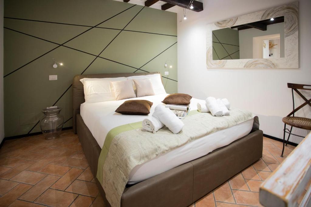 Ліжко або ліжка в номері Sofia alla VII Coorte