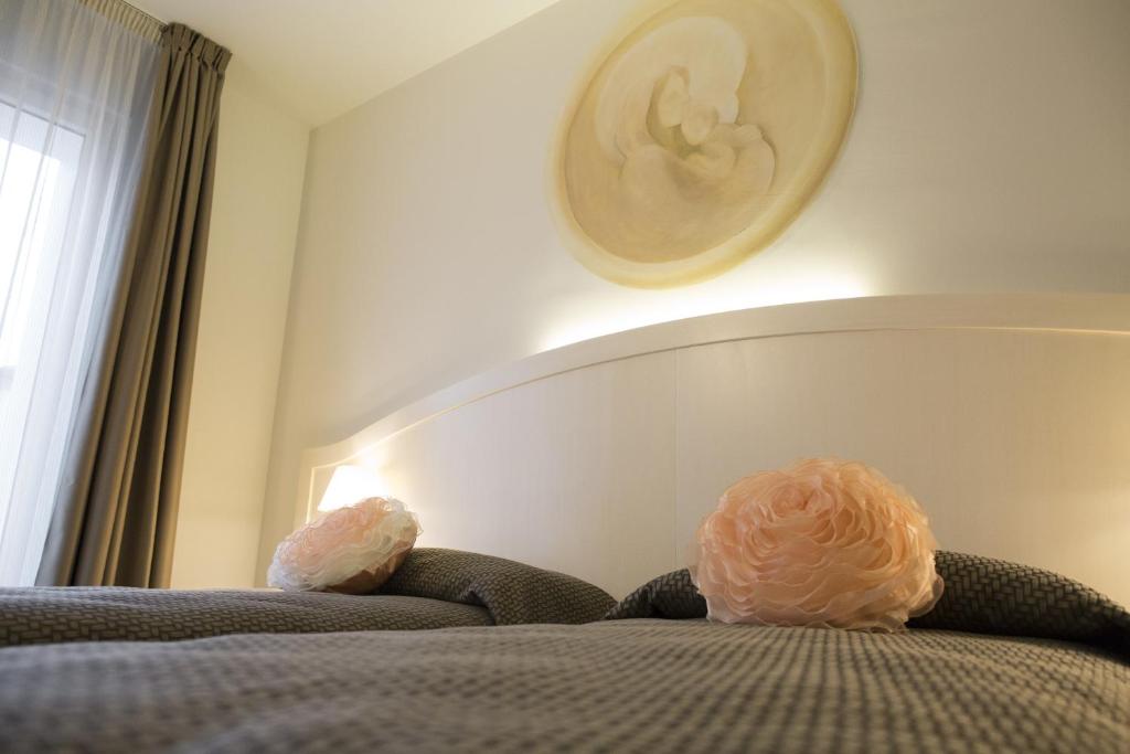 Postel nebo postele na pokoji v ubytování Hotel Diamante