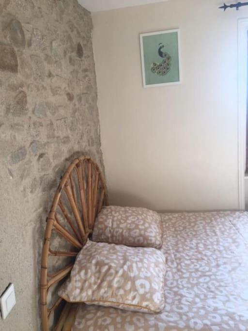 Posteľ alebo postele v izbe v ubytovaní Joli appartement Les Archers
