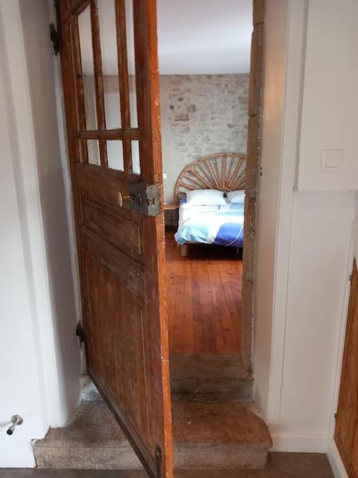 Posteľ alebo postele v izbe v ubytovaní Joli appartement Les Archers