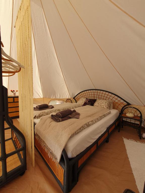 Postel nebo postele na pokoji v ubytování Farm Glamping Ráckeve