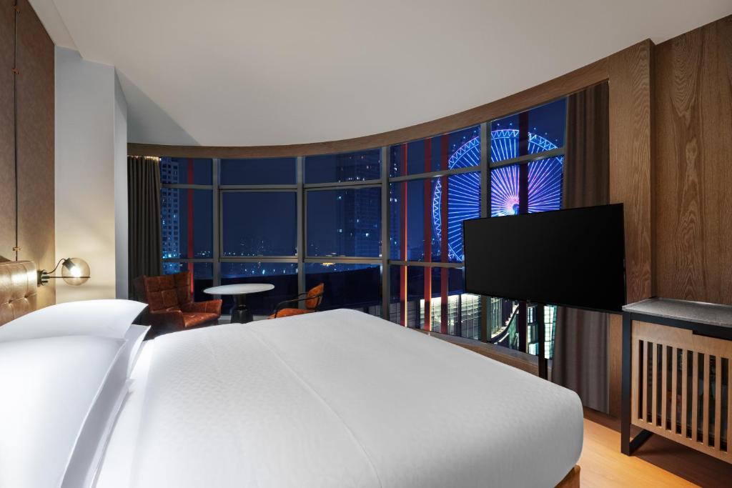 Postel nebo postele na pokoji v ubytování Four Points by Sheraton Chongqing, Yongchuan