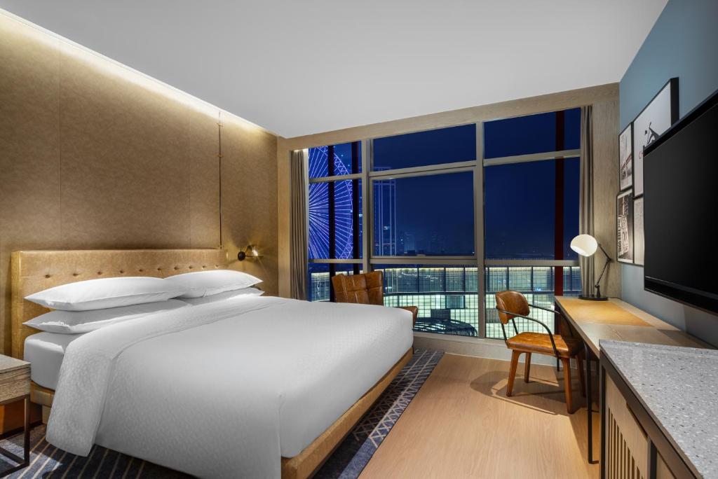 Postel nebo postele na pokoji v ubytování Four Points by Sheraton Chongqing, Yongchuan