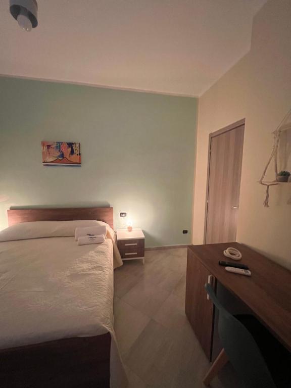 A bed or beds in a room at Casa Michele