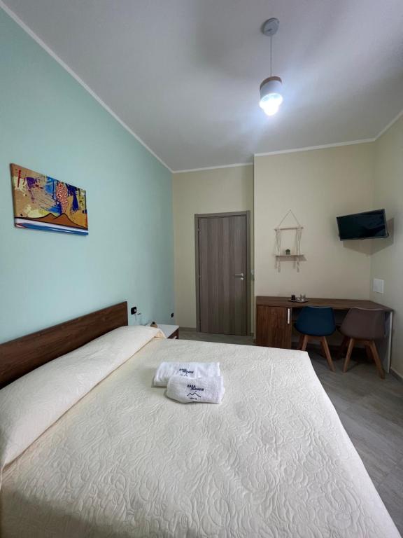 A bed or beds in a room at Casa Michele