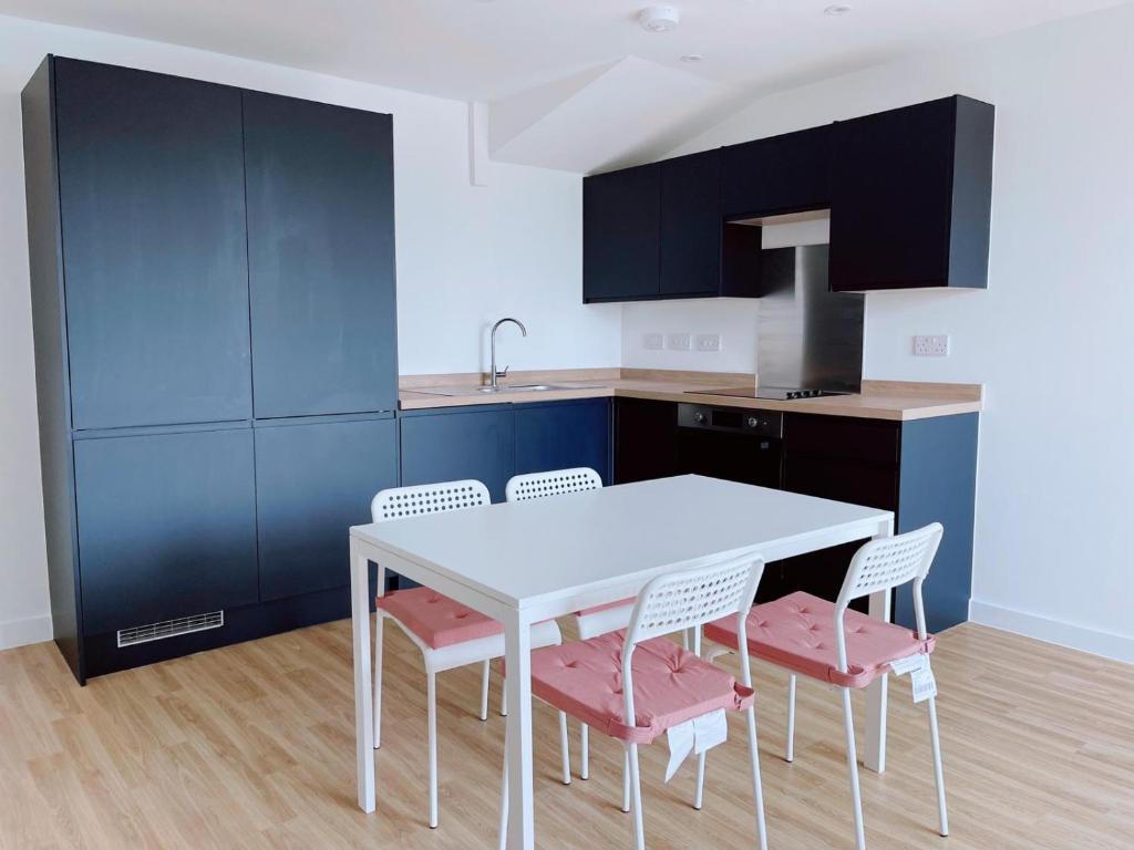 Kuchyň nebo kuchyňský kout v ubytování Modern House