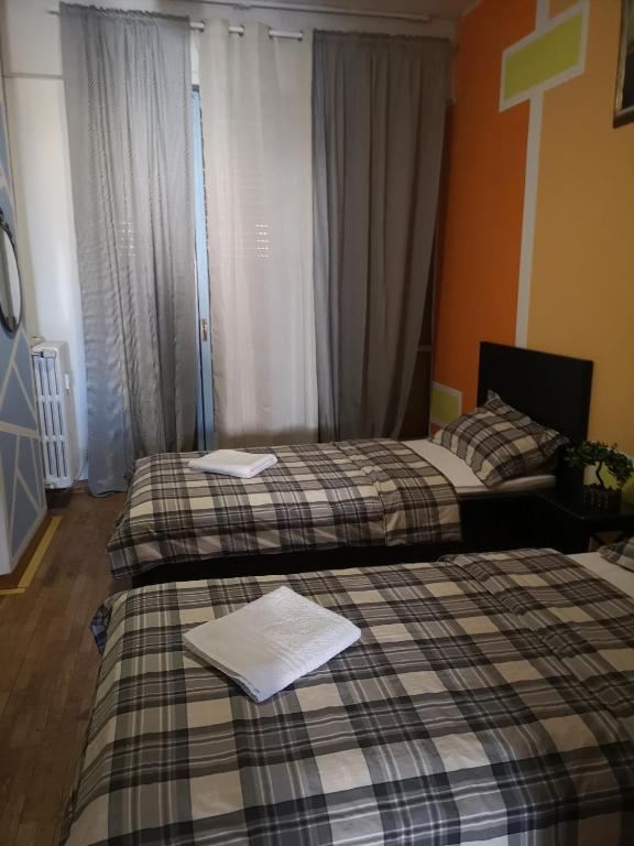 Postel nebo postele na pokoji v ubytování Firenze inn 21 Florence