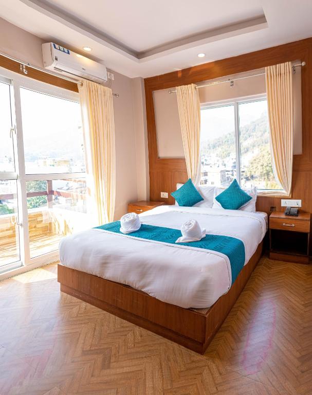 Postel nebo postele na pokoji v ubytování Majheri Resort and Spa