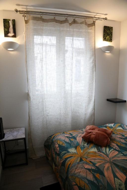 Posteľ alebo postele v izbe v ubytovaní Le Paradis de l'Isle