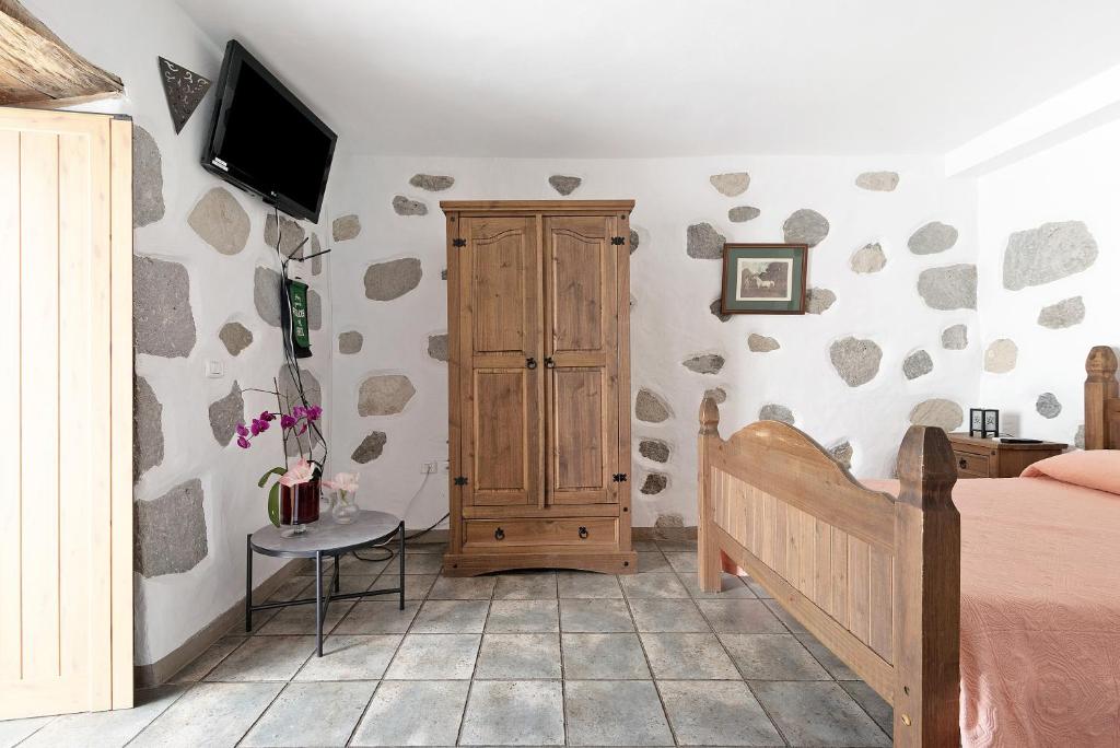 TV a/nebo společenská místnost v ubytování Vivienda Vacacional Risco Blanco