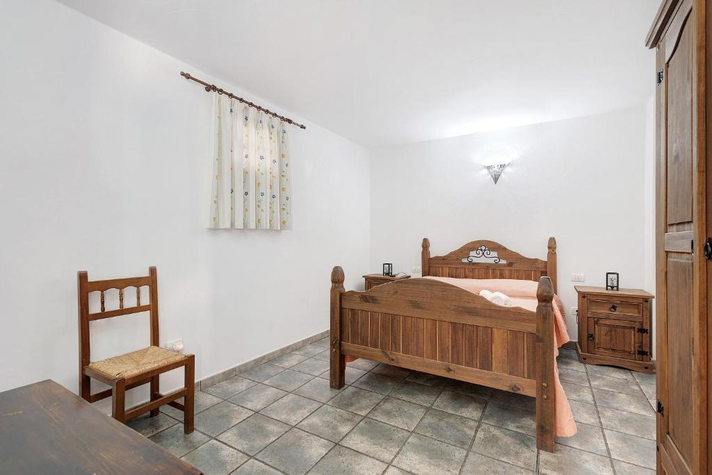Postel nebo postele na pokoji v ubytování Vivienda Vacacional Risco Blanco