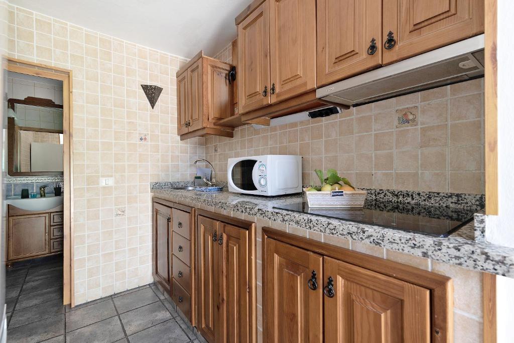 Kuchyň nebo kuchyňský kout v ubytování Vivienda Vacacional Risco Blanco