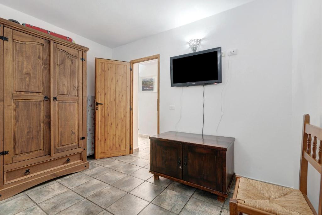 TV a/nebo společenská místnost v ubytování Vivienda Vacacional Risco Blanco
