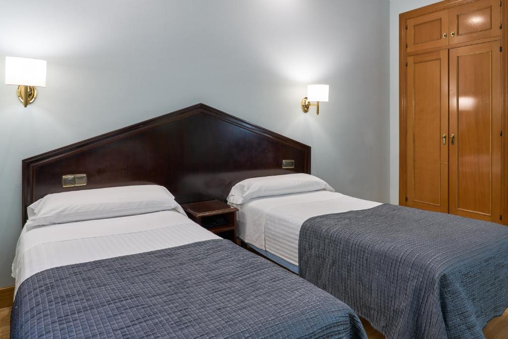 Postel nebo postele na pokoji v ubytování Porcel Navas
