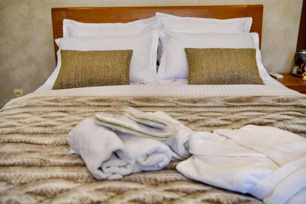 Postel nebo postele na pokoji v ubytování Hotel Late