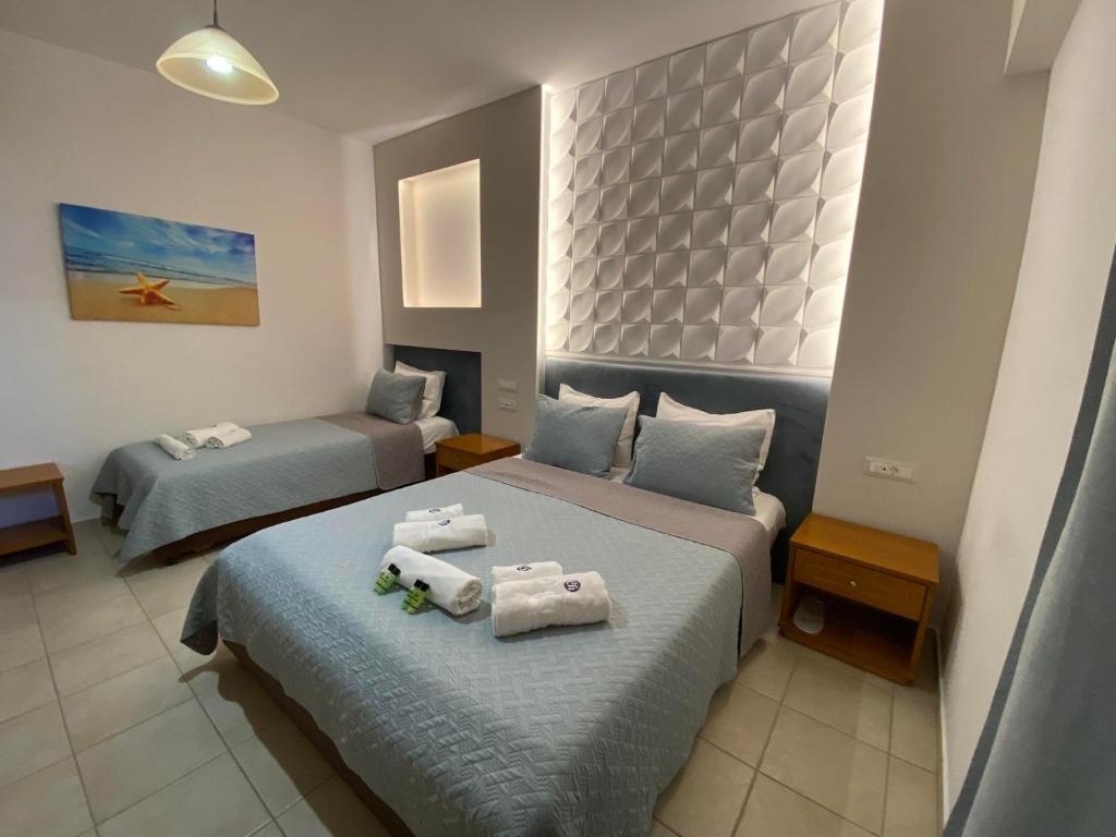 Postel nebo postele na pokoji v ubytování Castro Hotel