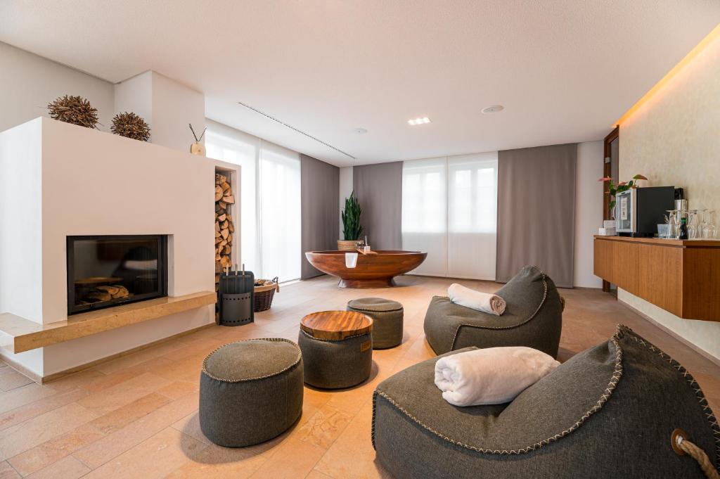 TV a/nebo společenská místnost v ubytování Neumühle Resort & Spa