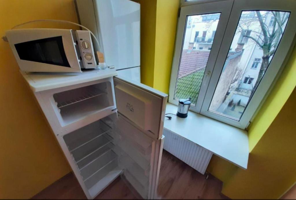 Kuchyň nebo kuchyňský kout v ubytování Relaxrooms Vienna Hernals
