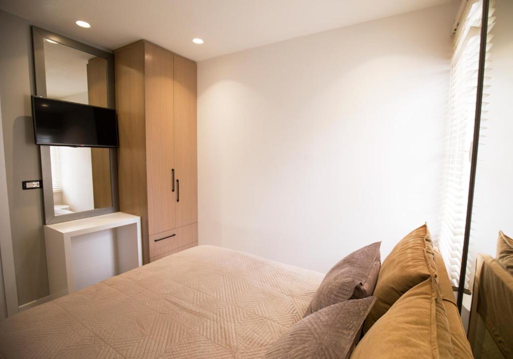 Postel nebo postele na pokoji v ubytování Tola Apartaments