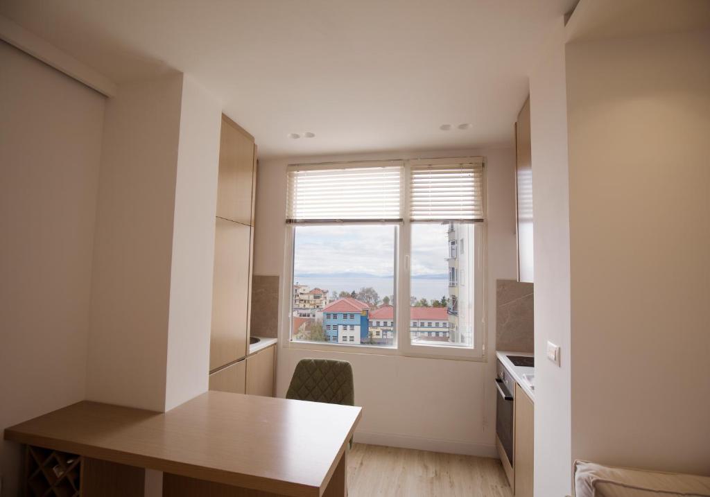 Kuchyň nebo kuchyňský kout v ubytování Tola Apartaments