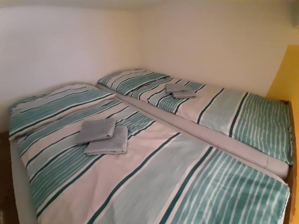 Postel nebo postele na pokoji v ubytování Relaxrooms Vienna Hernals