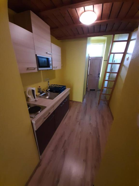 Kuchyň nebo kuchyňský kout v ubytování Relaxrooms Vienna Hernals