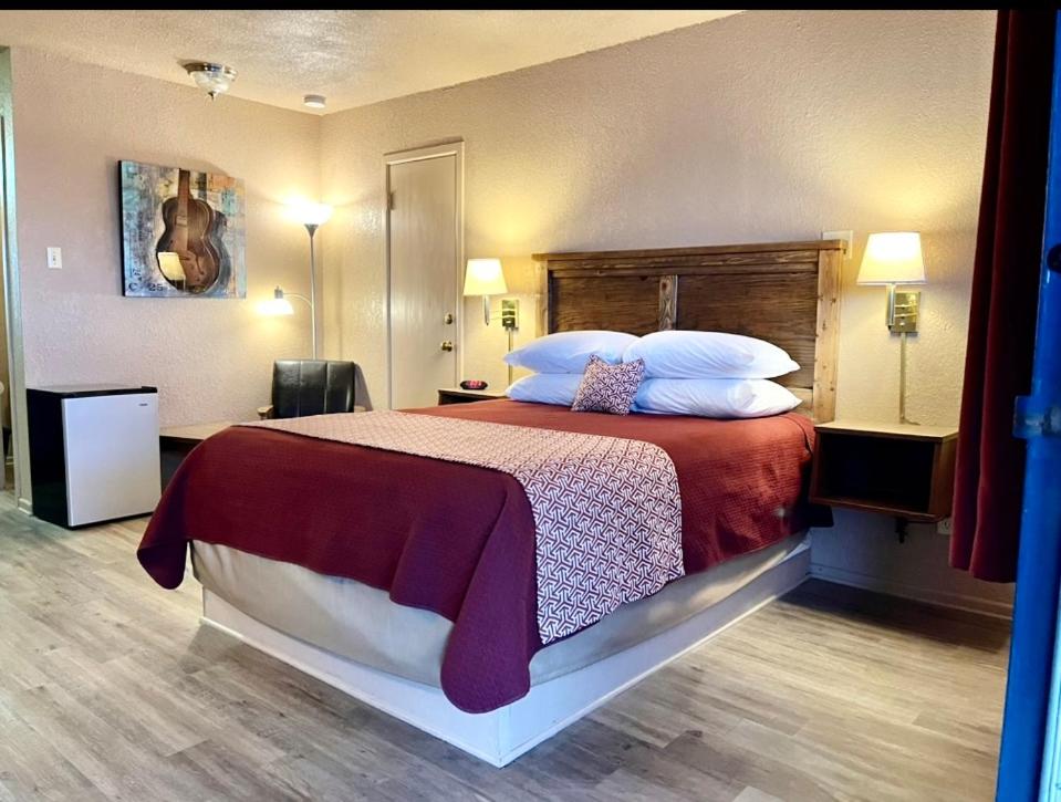 Postel nebo postele na pokoji v ubytování Best Inn Texas