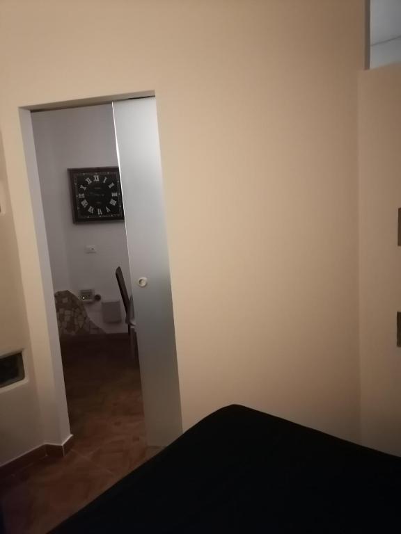 A bed or beds in a room at Loft 13- Suite 13 Struttura il Giglio