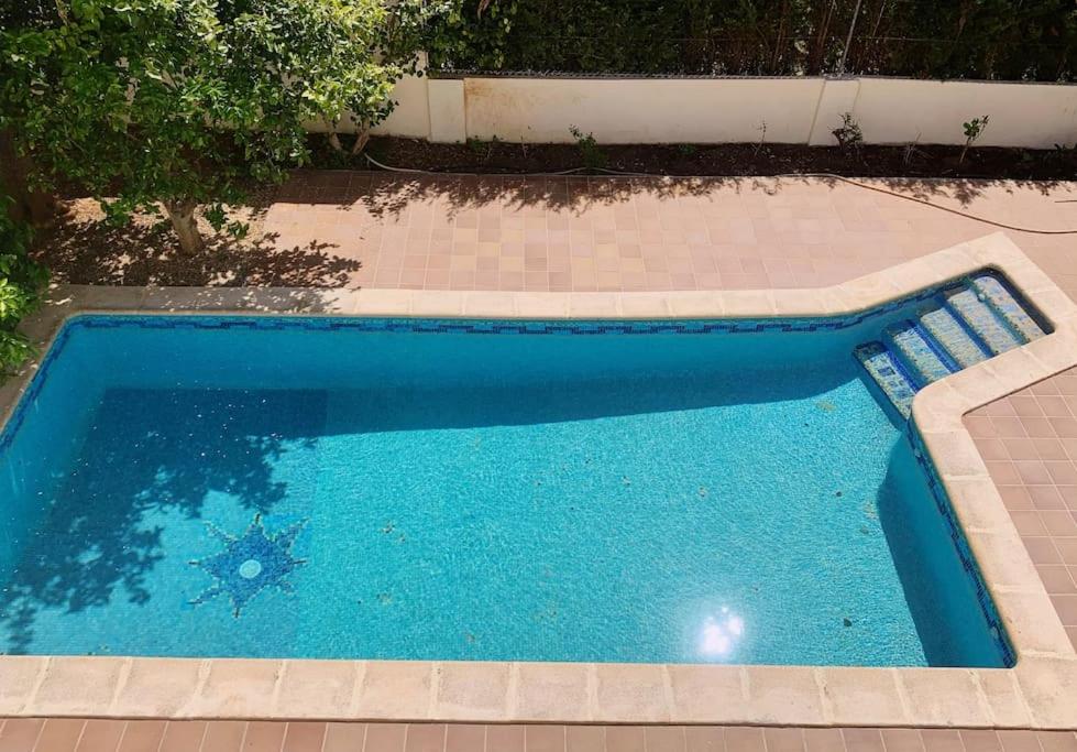 Bazén v ubytování Villa Los Robles en Playa den Bossa con Piscina Privada nebo v jeho okolí