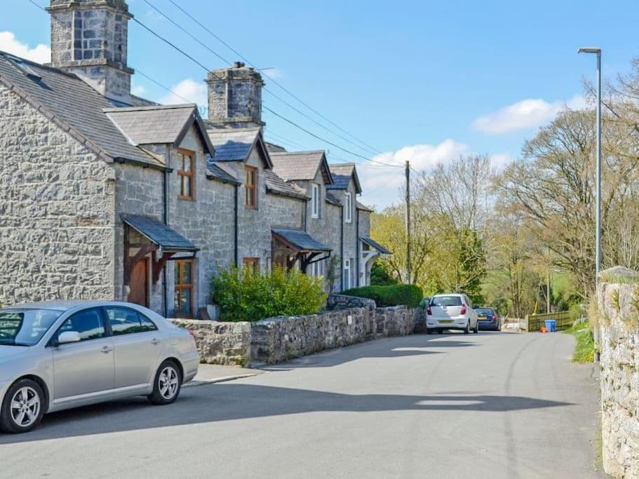 a car parked in front of a row of houses at Bellringers Cottage, Llandegla in Llandegla