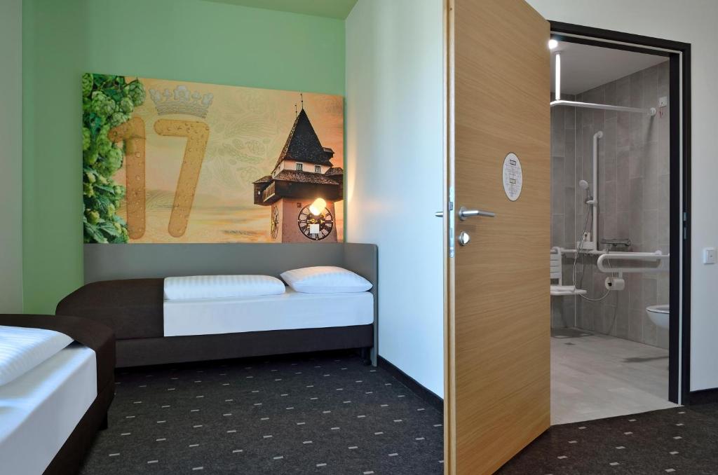 Uma cama ou camas num quarto em B&B Hotel Graz City-Süd