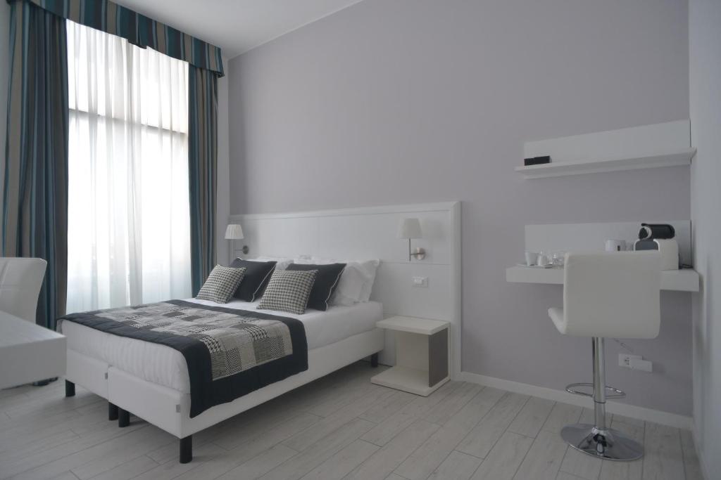 Łóżko lub łóżka w pokoju w obiekcie Lata Luxury Rooms