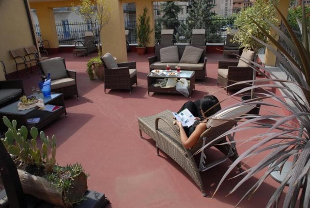 Posezení v ubytování Hotel Scrivano
