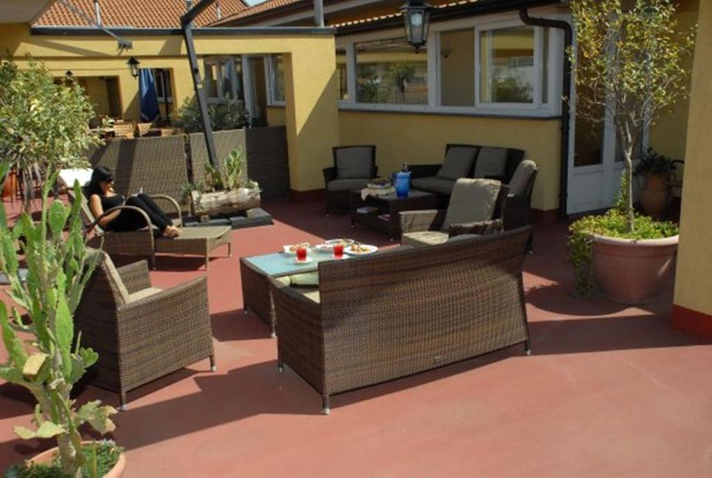 Posezení v ubytování Hotel Scrivano