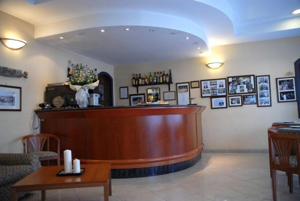 Nápoje v ubytování Hotel Scrivano