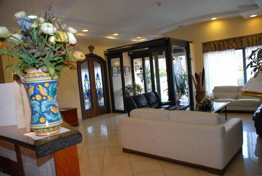 Posezení v ubytování Hotel Scrivano