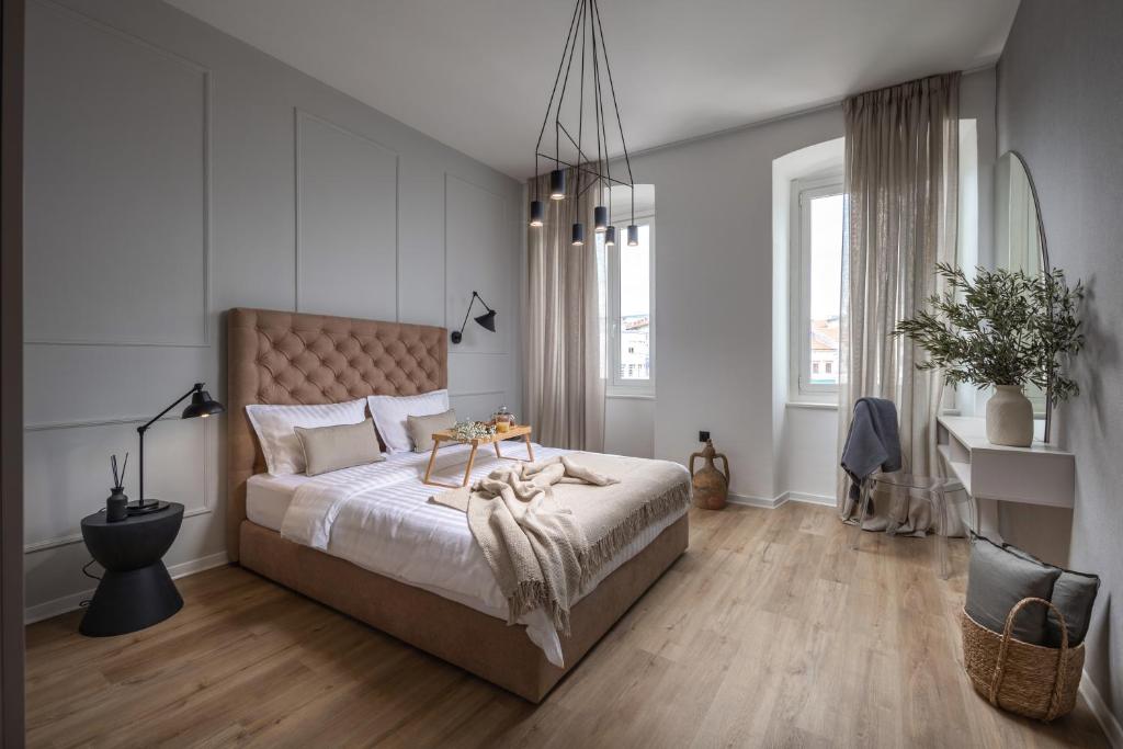 Postel nebo postele na pokoji v ubytování Apartment Centro Pola