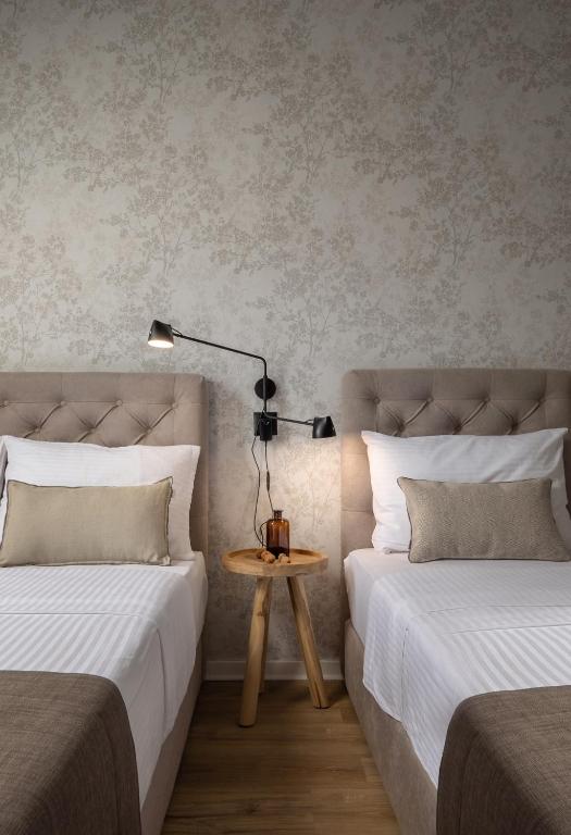 Postel nebo postele na pokoji v ubytování Apartment Centro Pola